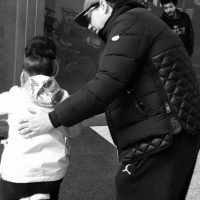 Black and white photo paul powell and child