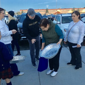 A group gathers at an outdoor event in Las Vegas, potentially at risk of accidents, needing personal injury assistance from a local law firm.