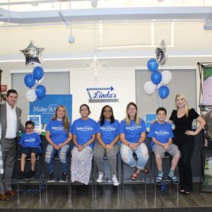 Las Vegas attorneys and Make-A-Wish children at a fundraiser, supporting the Las Vegas community and its families.