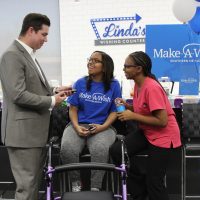 Paul Powell and smiling women