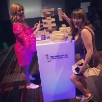 Women play Jenga Boys & Girls club