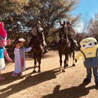 Costumes and horses community picnic
