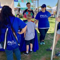 Paul Powell staff and child