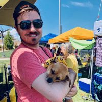 Man holding dog
