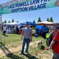 Paul Powell and banner