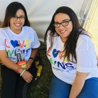 Women posing pride festival