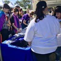 crowded merchandise stand pride festival