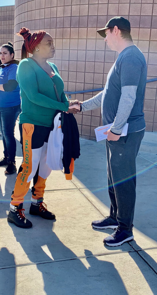 Image of a client shaking hands with a lawyer in Las Vegas, suggesting a meeting about a personal injury case.