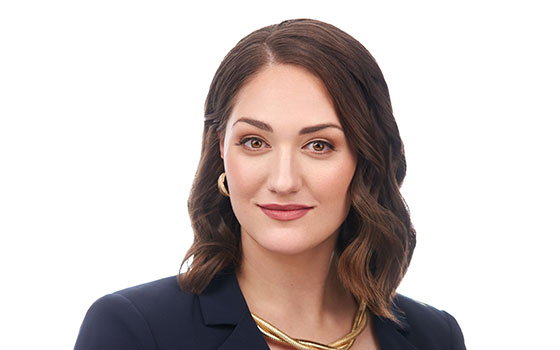 Professional headshot of a confident female attorney, suitable for a Las Vegas personal injury law firm website.